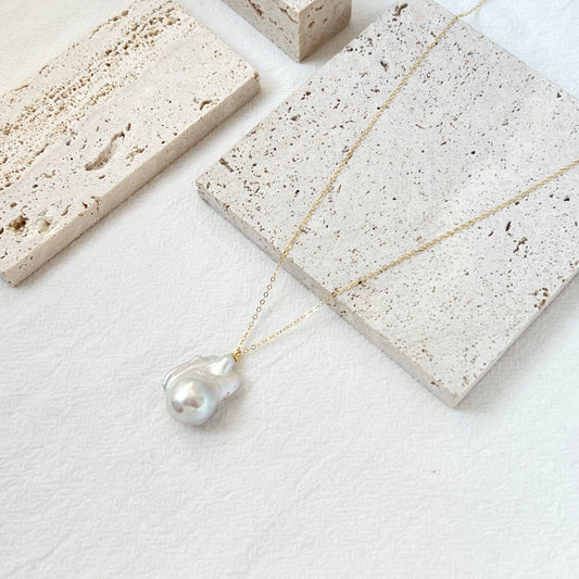 Front view of 14K gold-filled necklace with a large baroque pearl
