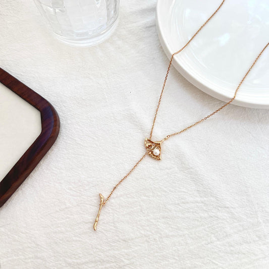 18K gold long Y-lariat necklace with dainty pearl charm, minimalist style