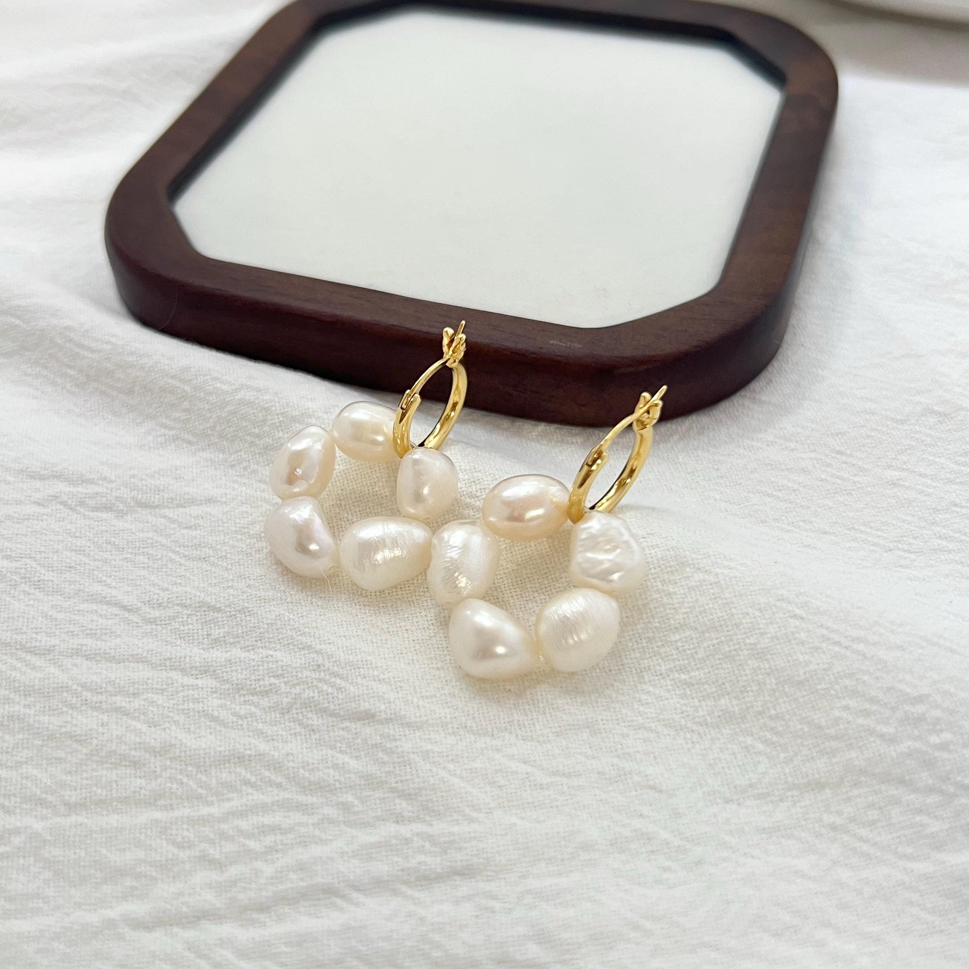 18K gold baroque pearl flower drop earrings shown from multiple angles, minimalist and elegant design