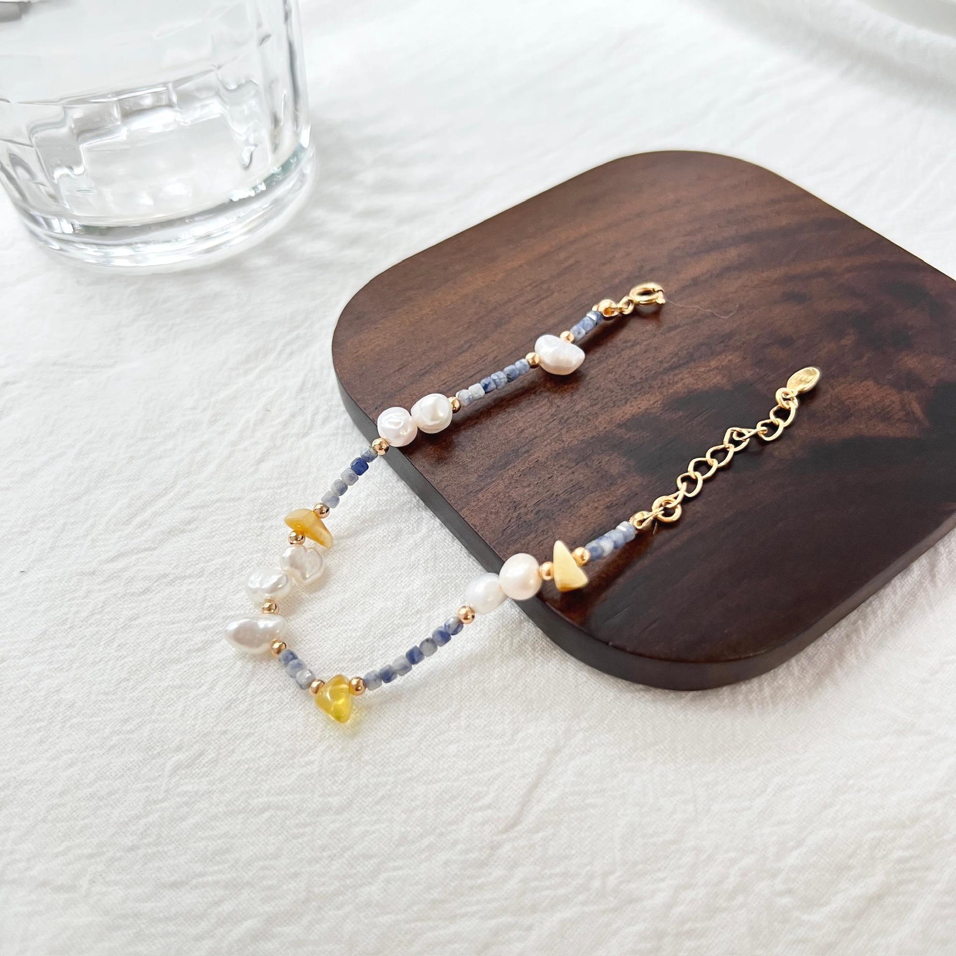 18K gold baroque pearl, lapis lazuli, and beeswax bracelet in gift box