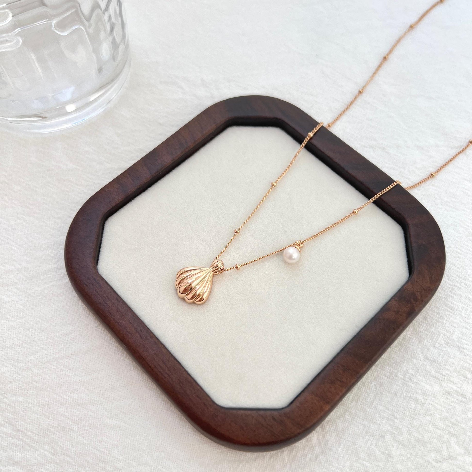 18K gold shell freshwater pearl charm necklace presented in eco-friendly gift box