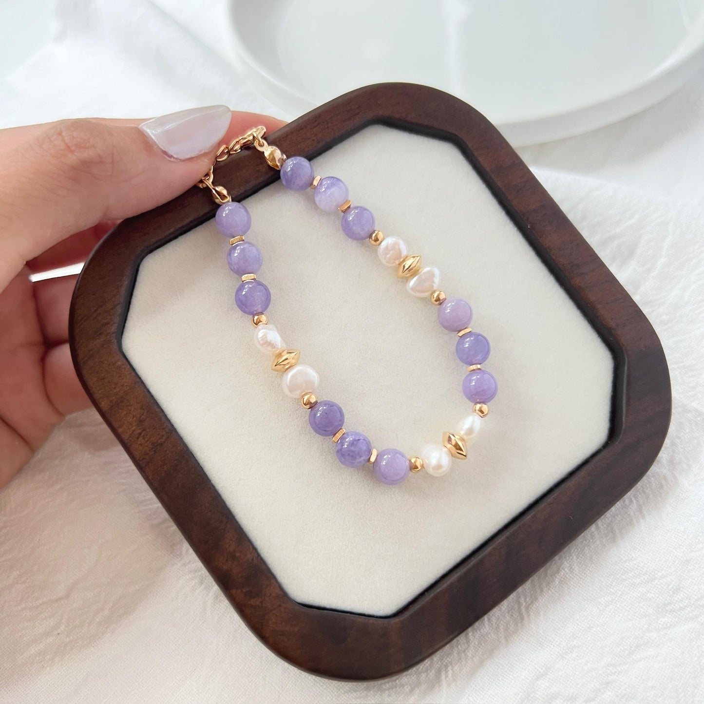 Ocealine Jewelry branded image featuring 18K gold baroque pearl and lepidolite bracelet