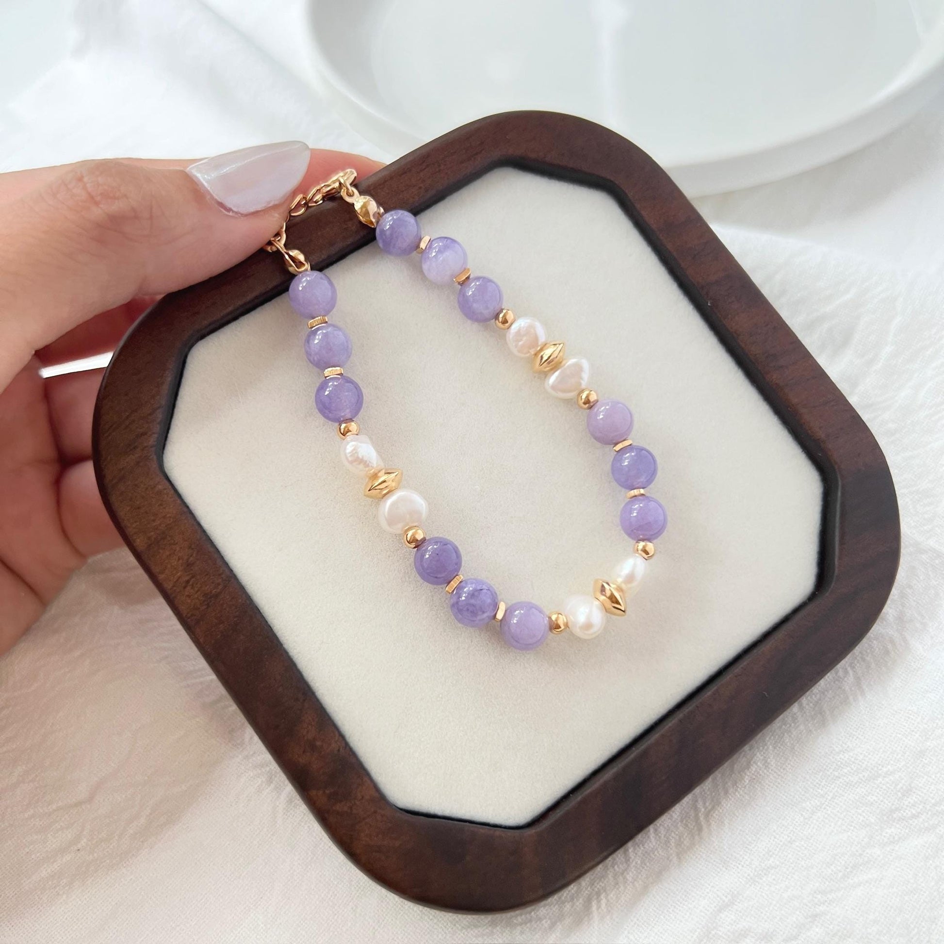 Ocealine Jewelry branded image featuring 18K gold baroque pearl and lepidolite bracelet