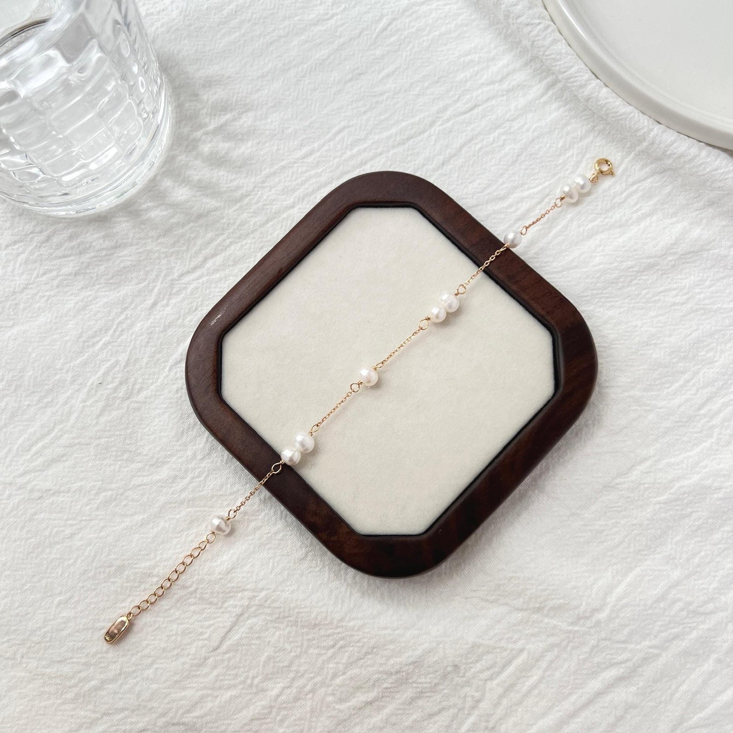 Side view of 18K gold baroque pearl beaded bracelet, delicate and dainty