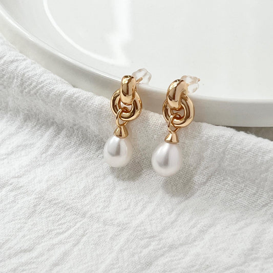 18K gold vintage pearl dangling earrings with Celtic knot design, front view