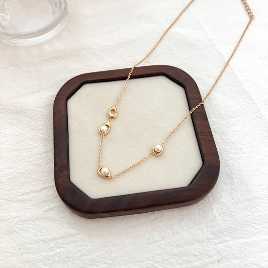 18K gold minimalist pearl choker necklace with sterling silver chain, dainty modern jewelry for bridal and everyday wear.