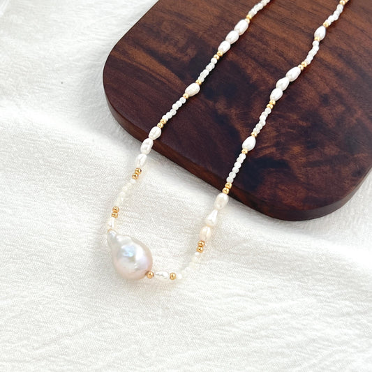 18K gold natural baroque pearl choker necklace, minimalist bridal and wedding jewelry, vintage-inspired.