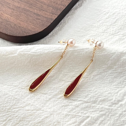 18K gold natural freshwater pearl dangle earrings with red glaze enamel teardrop, minimalist and dainty jewelry for bridal or everyday wear.