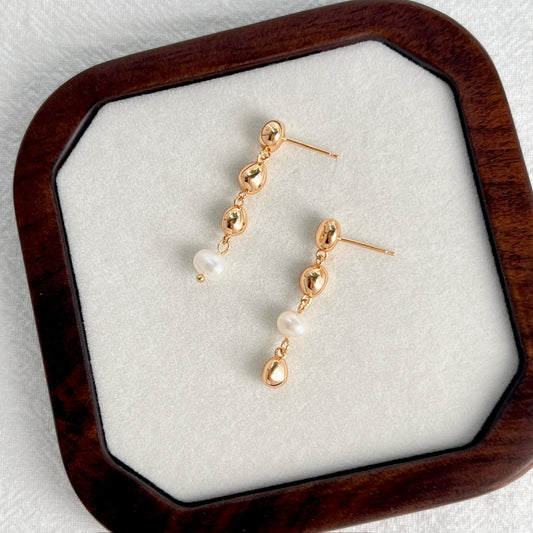 Ocealine Jewelry branding image featuring 18K gold beaded freshwater baroque pearl drop earrings