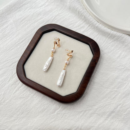 organic baroque pearl drop earrings with sculptural gold detail, soft and refined