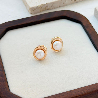 18k gold freshwater pearl studs on ear classic vintage style accessory
