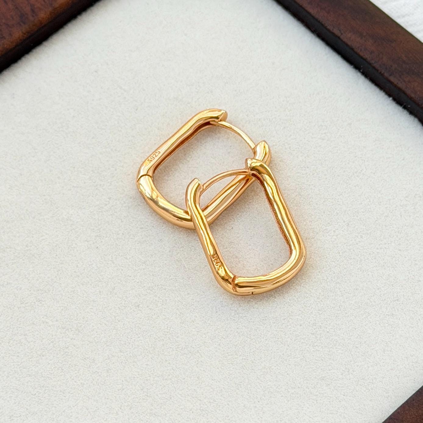 minimalist 18k gold rectangular hoop earrings versatile modern accessory
