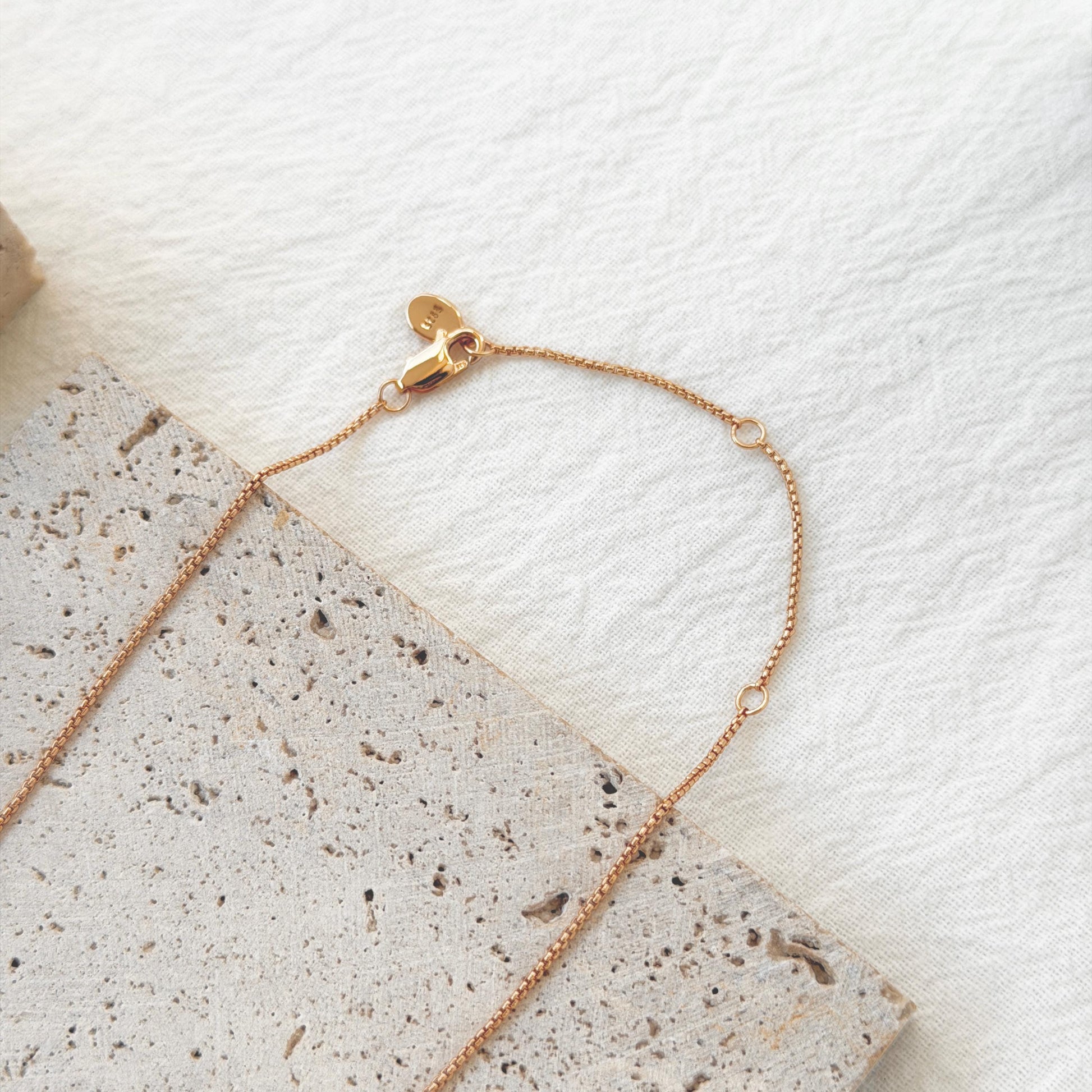 18k gold knot tassel pendant necklace on neck chic elegant style
