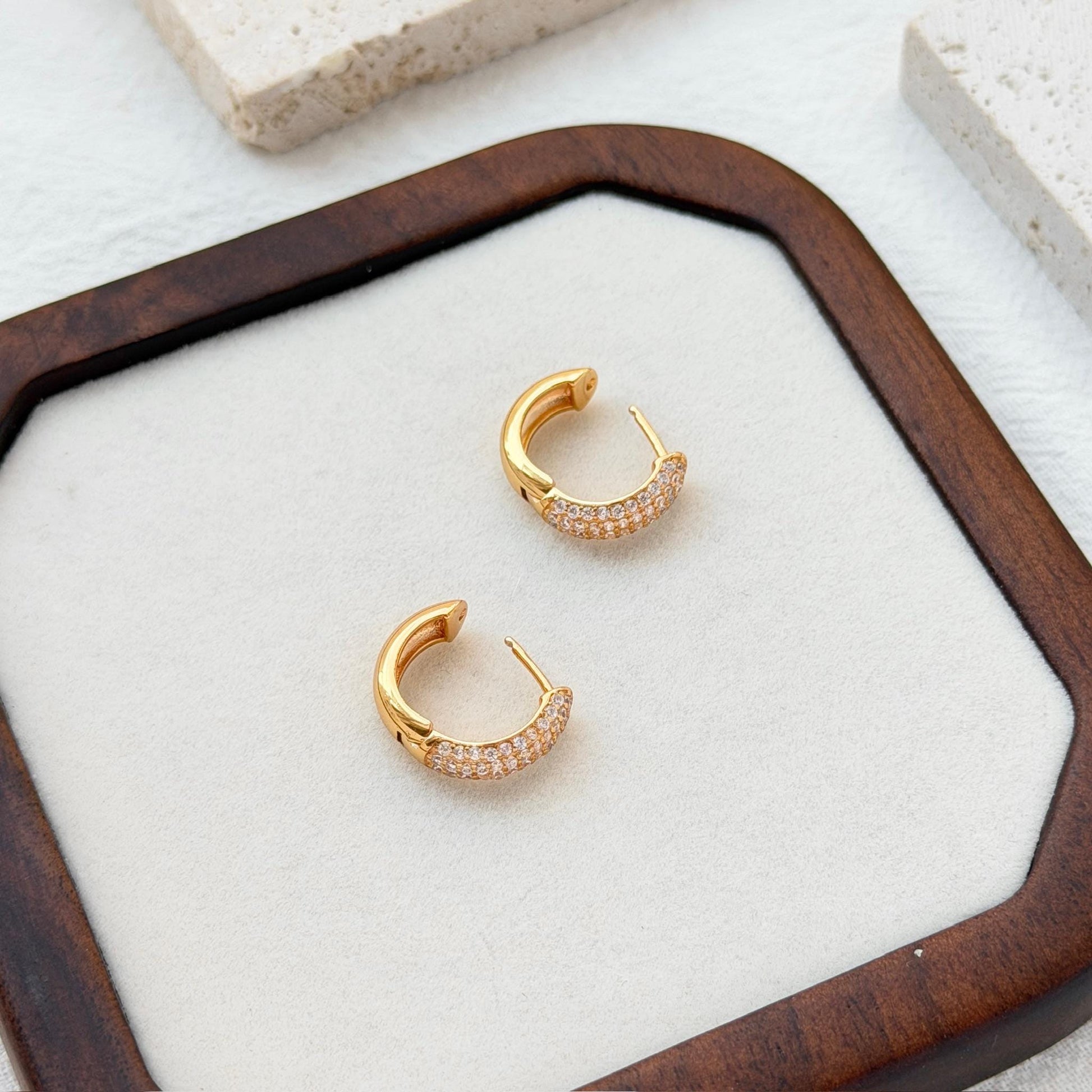18k gold cz huggie hoop earrings on ear everyday chic accessory
