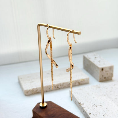 18k gold tassel drop earrings on ear vintage chic accessory
