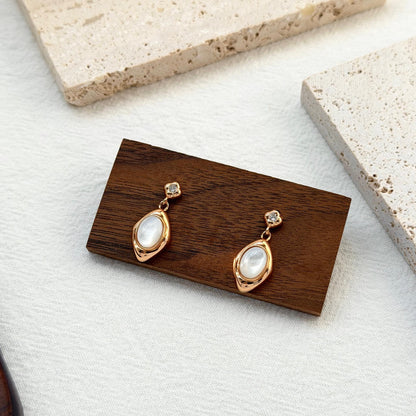 delicate gold drop earrings with soft iridescent shell, timeless and effortless everyday jewelry