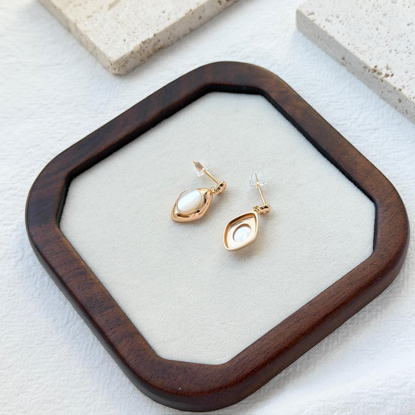minimalist oval mother of pearl earrings in warm vintage gold tone, lightweight and refined for everyday wear