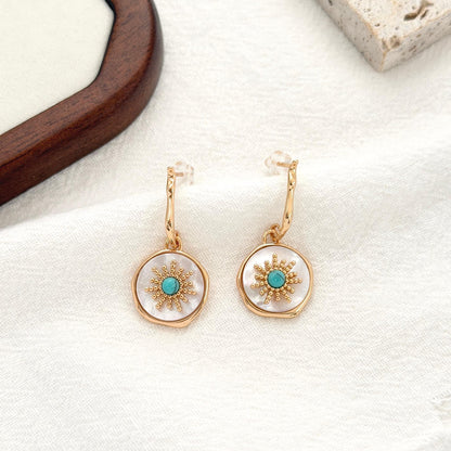 turquoise and shell earrings gold sunburst design drop earrings