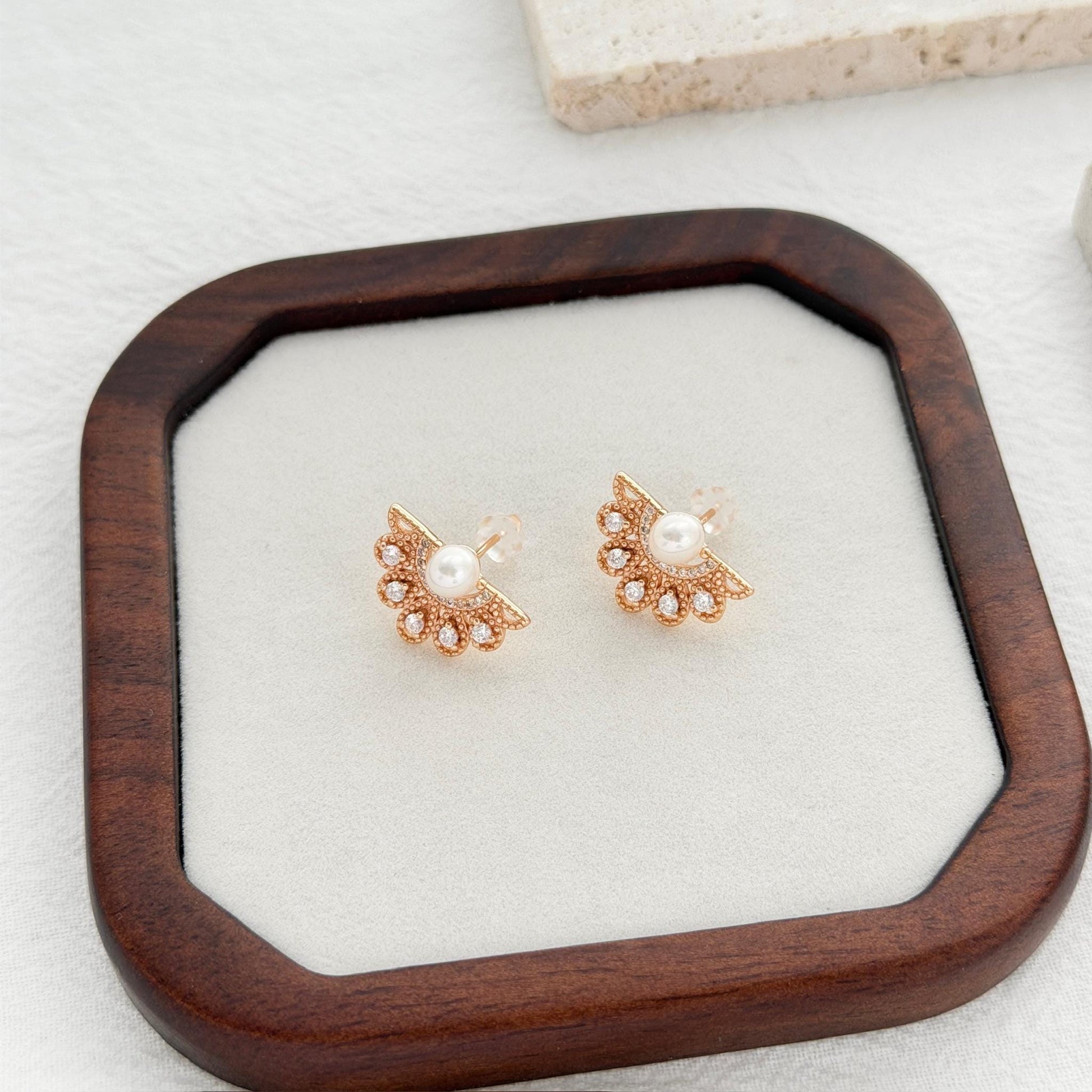 pearl stud earrings gold fan design with sparkling cubic zirconia