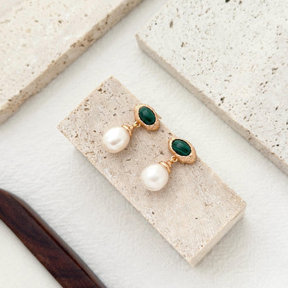 Elegant malachite and pearl earrings crafted in gold over sterling silver with statement design