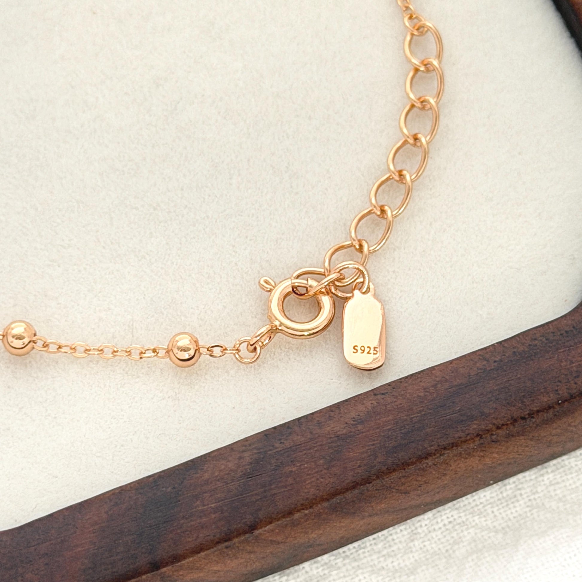 Delicate gold chain bracelet with tiny polished beads and minimalist modern feel