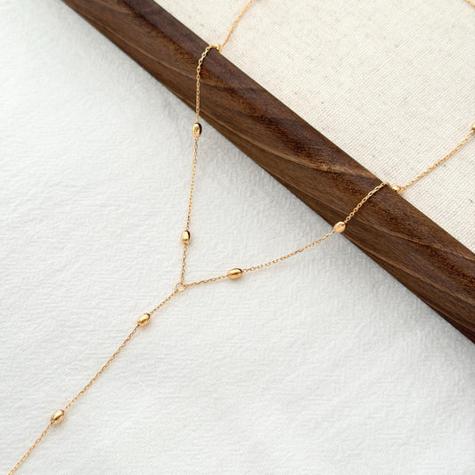 Delicate gold satellite chain necklace with adjustable extender