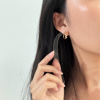 Gold Statement Huggie Hoops with Cubic Zirconia Knot Design