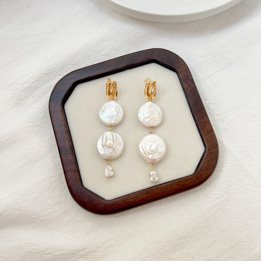 Woman wearing Rome Coin pearl drop dangle earrings, perfect for weddings or bridesmaids